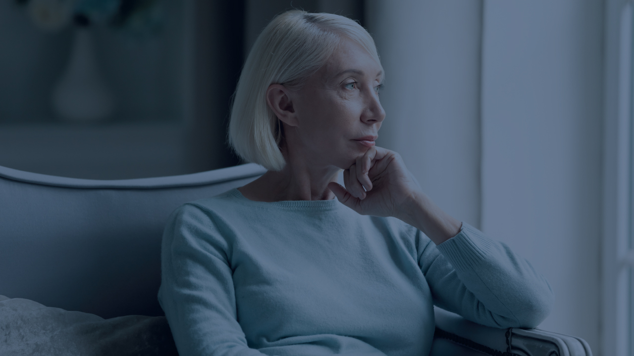 A widow looks out the window