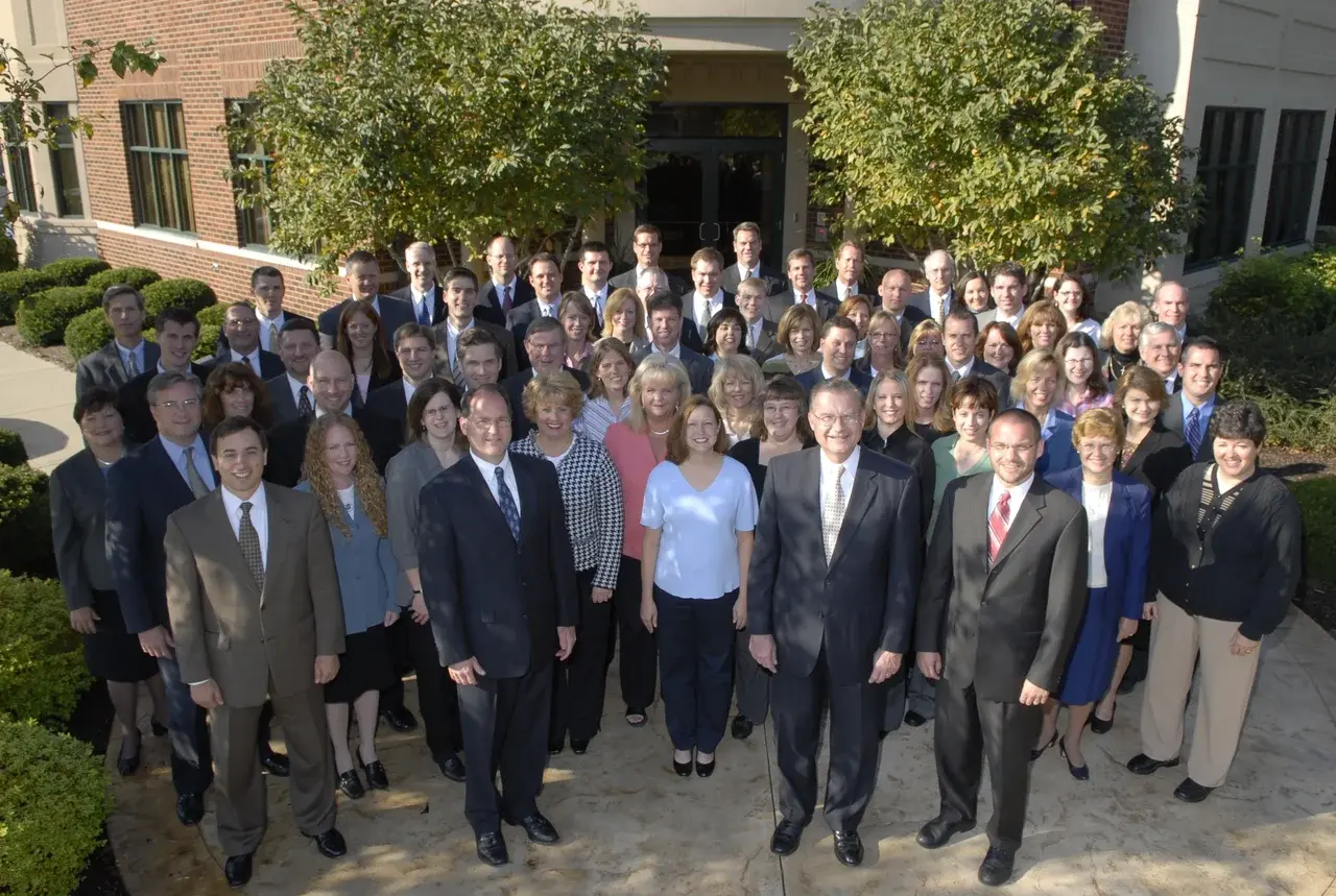 Group photo of JIC employees outside the West Fork office, circa 2006